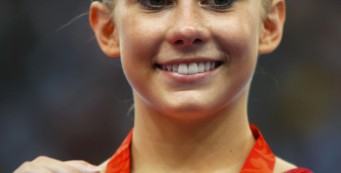 Silver medallist Johnson of U.S. poses after women's individual all-round gymnastics final at Beijing 2008 Olympic Games